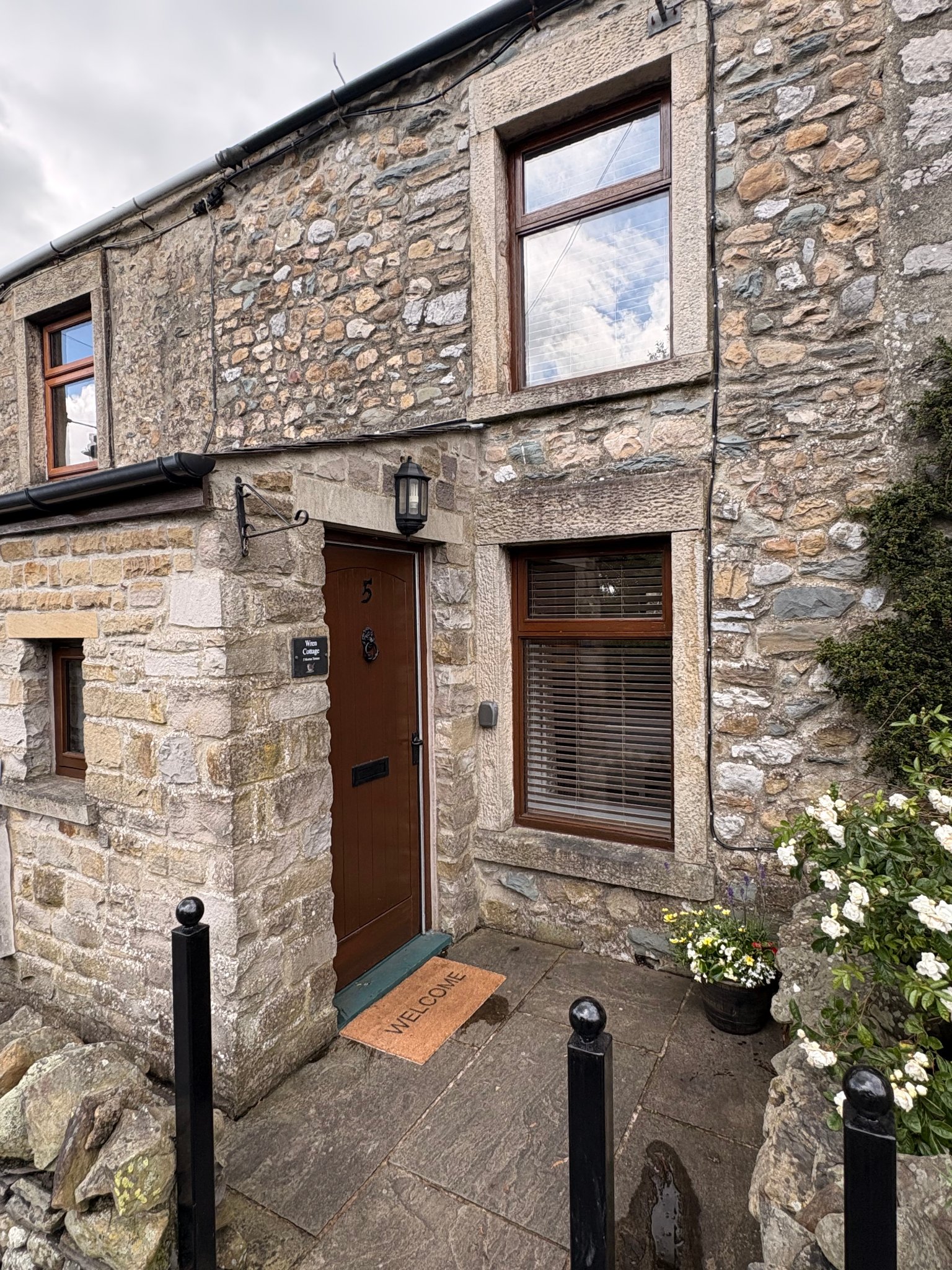 Traditional stone cottage exterior in Ingleton, Yorkshire Dales