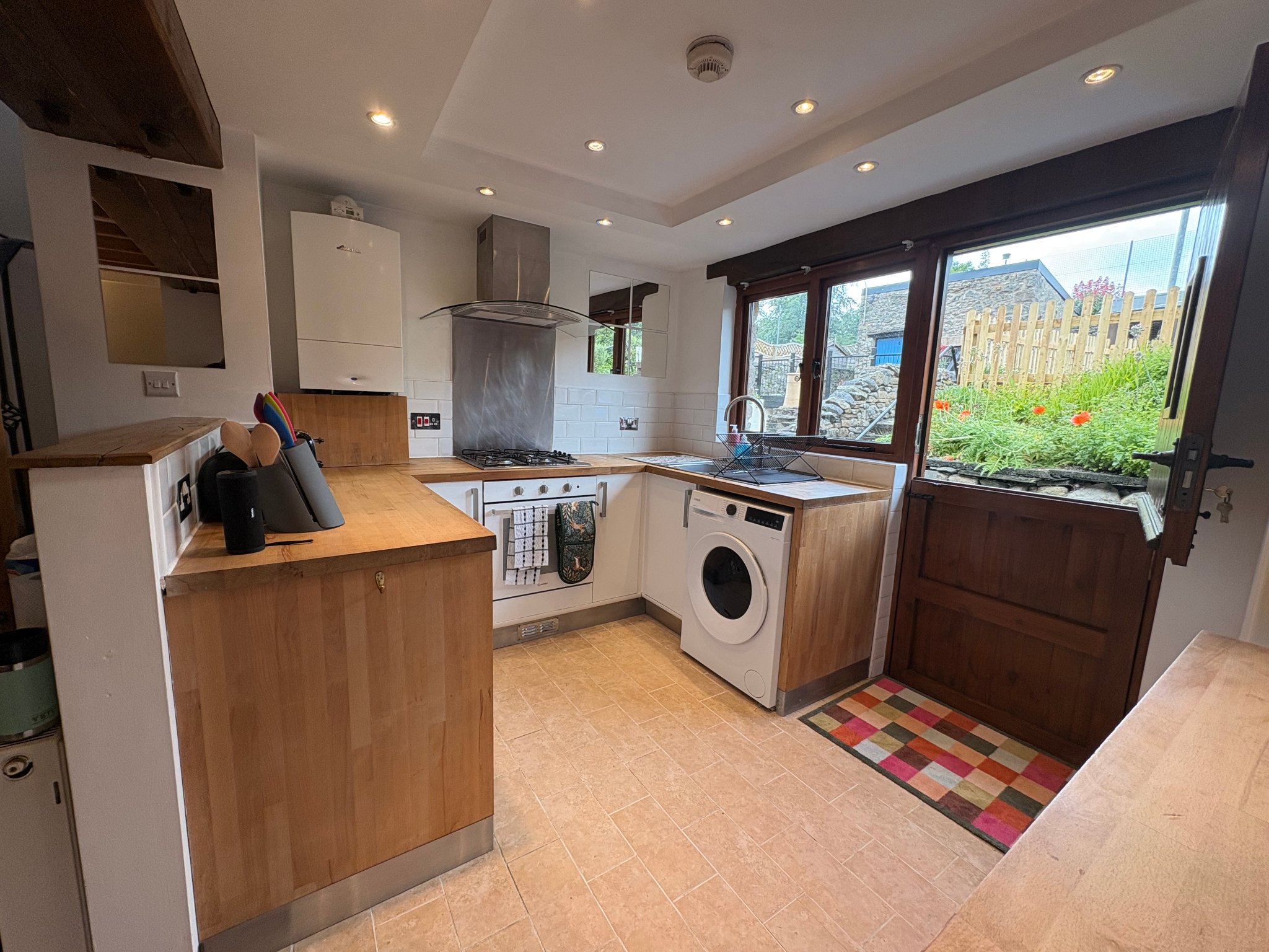 Fully equipped farmhouse-style kitchen